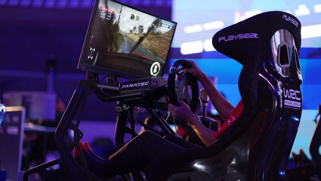 sim racer in action, 2021 WRC esports Grand Final